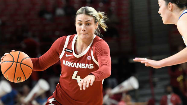 Razorbacks' Saylor Poffenbarger drives lane against UCLA